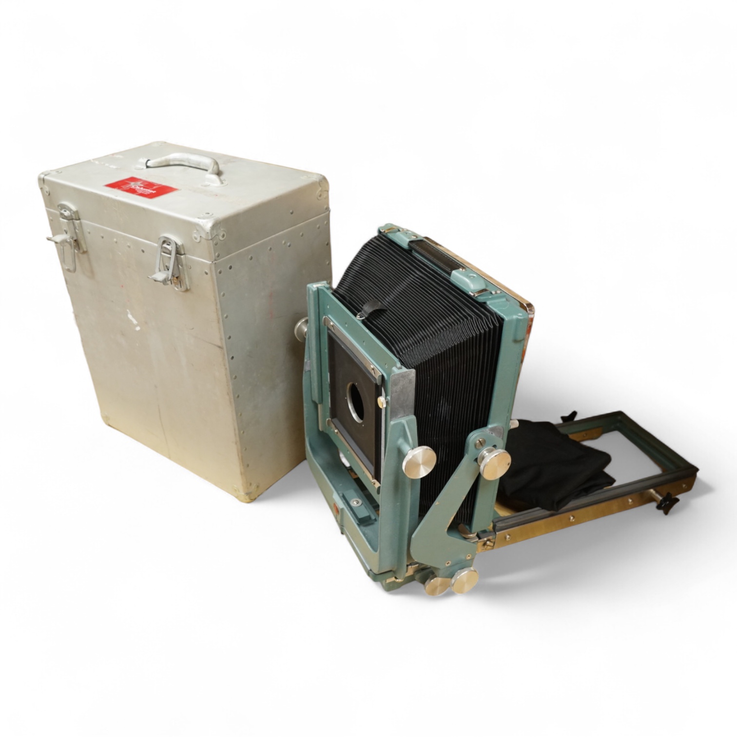 A Calumet C1, 1950s 10 x8 studio camera in its original flight case with applied label reading; ‘Calumet Manufacturing Company, Chicago, Illinois, Made in U.S.A.’